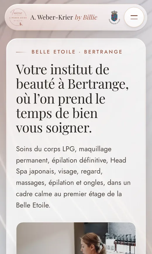 The home page at phone width with the glass navigation, the headline and a booking button bar at the bottom.